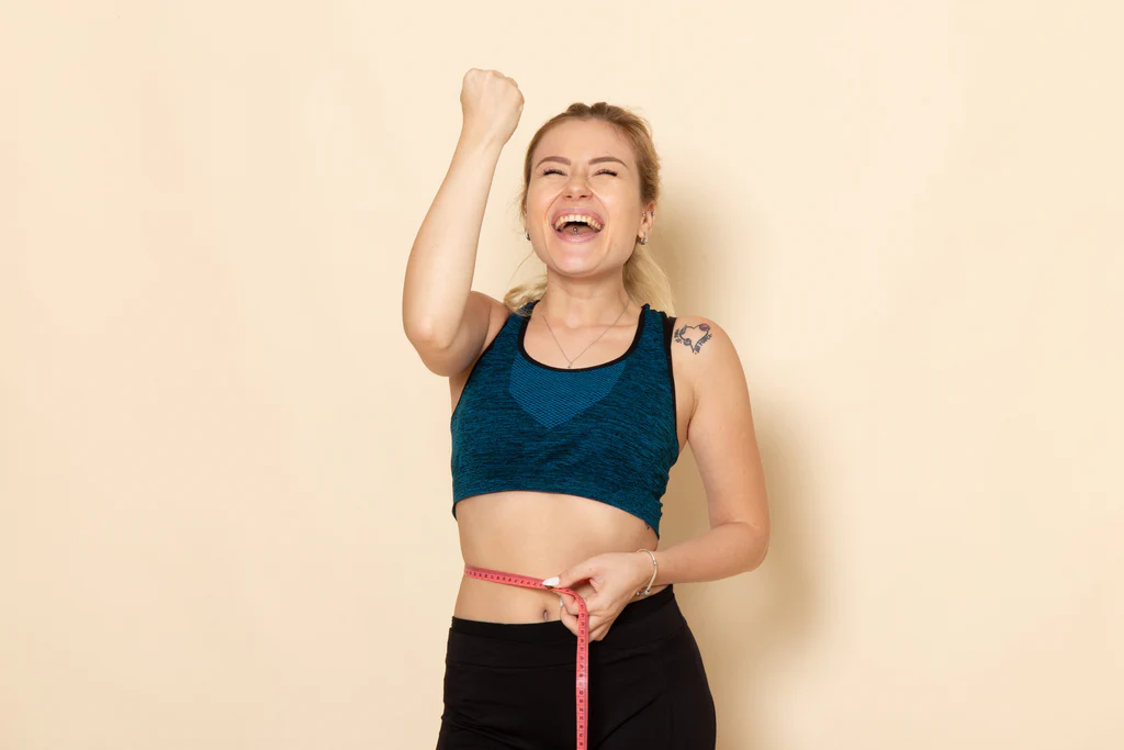 front-view-young-female-sport-outfit-measuring-her-sizes-waist_1024x1024